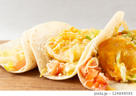 Shrimp Tacos with Shrimp, Vegetables, and Spices Wrapped in Tortillas 124849593