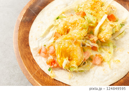 Shrimp Tacos with Shrimp, Vegetables, and Spices Wrapped in Tortillas 124849595