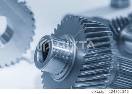 Close up the transmission bevel gear spare parts in the light blue scene. 124851846