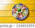 Festive Mexican tortillas with Aztec soup, chalupas, and lime garnish for celebrations like Cinco de Mayo and Dia de los Muertos 124852059
