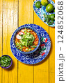 Delicious Pozole soup served in a colorful bowl with fresh toppings for Mexican Independence Day celebrations 124852068