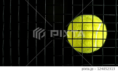 Tennis ball on rocket strings. 124852313