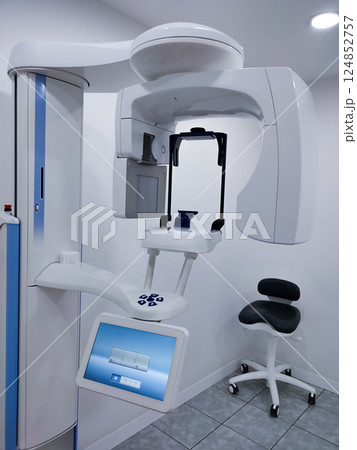 Cone beam computer tomography and protective cape in clinic 124852757