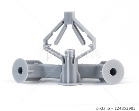 butterfly style plastic dowel isolated. High quality photo butterfly style plastic dowel isolated. High quality photo 124852983