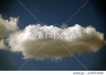 Sky with beautiful cumulus clouds conveying volume and distance 124853090