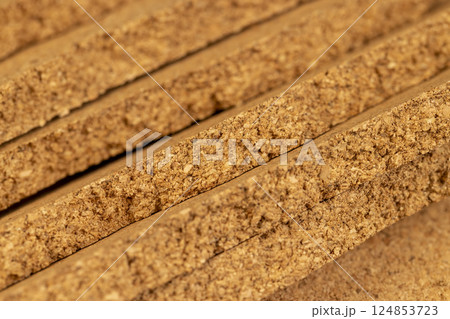 durable material that is obtained from the bark of a cork tree close up 124853723