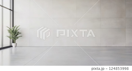 Modern empty interior space with a potted plant and large windows for natural light 124853998