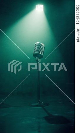 Vintage microphone stands on a stage, illuminated by a spotlight in a smoky atmosphere, creating an evocative scene for singing, stand up comedy, or any live performance Vintage microphone stands on a stage, illuminated by a spotlight in a smoky atmosphere, creating an evocative scene for singing, stand up comedy, or any live performance 124855509