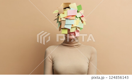 Person with head covered in colorful sticky notes symbolizing mental overload, stress, and burnout. Conceptual representation of information overload and cognitive pressure 124856143