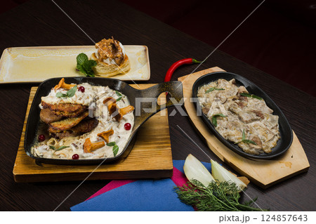 Set of potato pancakes with mushrooms, meat in 124857643