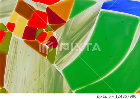 Colorful abstract stained glass featuring a blend of diferent colors Colorful abstract stained glass featuring a blend of diferent colors 124857990