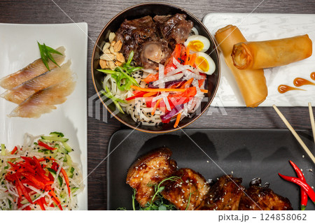 A set of Japanese dishes on the table 124858062