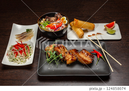 A set of Japanese dishes on the table 124858074
