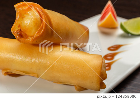 Japanese stuffed pancakes on a white plate with Japanese stuffed pancakes on a white plate with 124858080