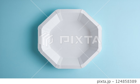 Minimalist White Octagonal Plate on Soft Blue Background Minimalist White Octagonal Plate on Soft Blue Background 124858389