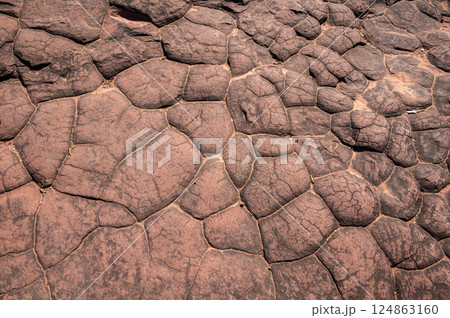 The surface of sun cracks rock in Phu Langka National Park of Bueng Kan province, Thailand. 124863160