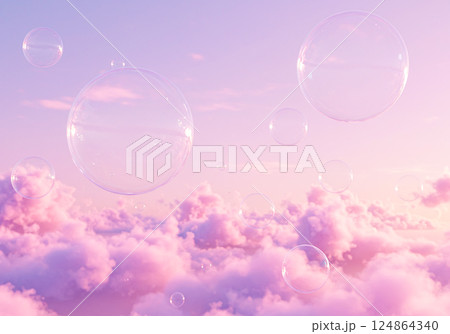 ピンク色に染まった空と雲の中を飛ぶシャボン玉 124864340