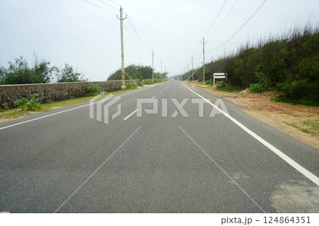 Coastal area side highway in odisha 124864351
