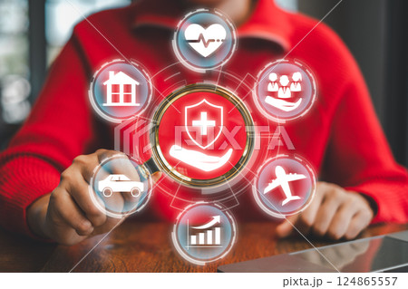 Visual representation of insurance concepts with icons for health, home, car, travel, and finance in a digital interface. 124865557