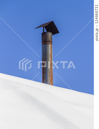 Chimney on the roof Chimney on the roof 124868731