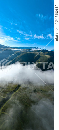 Aerial view of beautiful high altitude grassland mountain landscape Aerial view of beautiful high altitude grassland mountain landscape 124868933