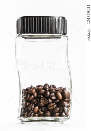 Jar with coffee grains Jar with coffee grains 124869131