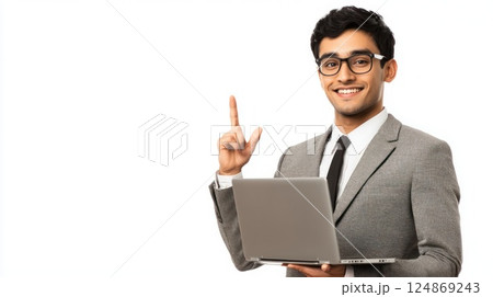 Smiling businessman holding laptop, pointing up, idea. 124869243