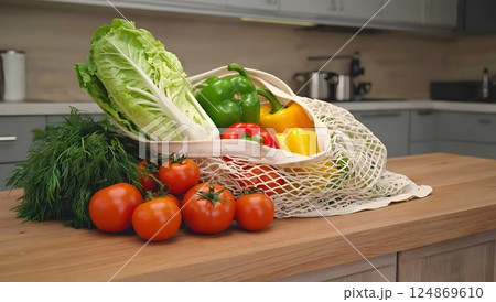 A rustic craft bag filled with fresh vegetables lies on a dark wooden background, symbolizing healthy, farm-to-table eating. 124869610