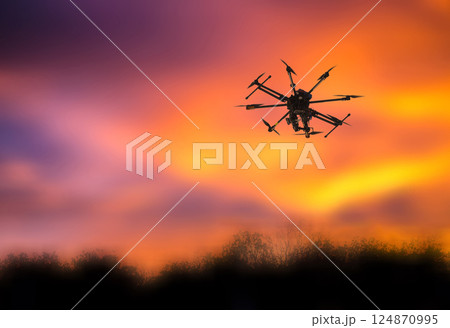 Multicopter in the air 124870995
