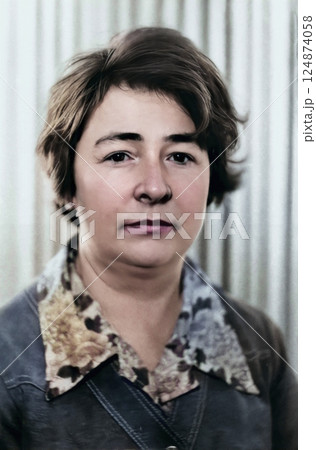 Vintage portrait of a middle-aged woman. Retro photo 1979. Vintage portrait of a middle-aged woman. Retro photo 1979. 124874058