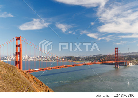 Iconic view of the Golden Gate Bridge bathed in warm sunlight 124876890
