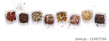 An assortment of various dry tea leaves, showcasing different textures, colors, and blends An assortment of various dry tea leaves, showcasing different textures, colors, and blends 124877198