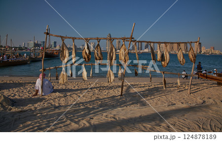 Doha , Qatar- December 6 2024: Group of Traditional Arabic fishermen in Katara cultural village in Doha, Qatar afternoon shot during Katara 14th traditional dhow festival Doha , Qatar- December 6 2024: Group of Traditional Arabic fishermen in Katara cultural village in Doha, Qatar afternoon shot during Katara 14th traditional dhow festival 124878189