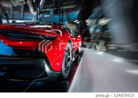 Stunning Red Sports Car Rear View in Showroom Display, Elegant Crimson Performance Vehicle Backside at Exhibition Showcase Stunning Red Sports Car Rear View in Showroom Display, Elegant Crimson Performance Vehicle Backside at Exhibition Showcase 124879515