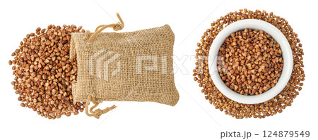Raw buckwheat in a bag and ceramic bowl isolated on white background. Top view. Flat lay 124879549
