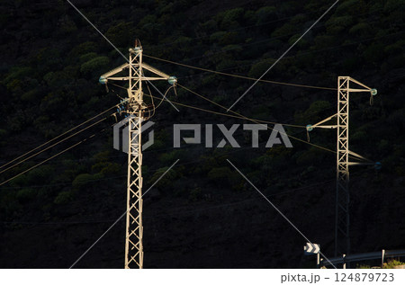 Transmission towers under the light of dawn. Transmission towers under the light of dawn. 124879723