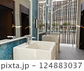 Wash stone basins at the hotel spa resort outside by swimming pool  124883037