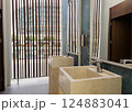 Wash stone basins at the hotel spa resort outside by swimming pool  124883041