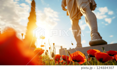 Statue of Mars, God of War, Among Poppies at Sunset in Military Graveyard Setting 124884307