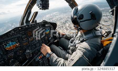 Pilot in cockpit flying military jet plane with advanced instrumentation over cityscape Pilot in cockpit flying military jet plane with advanced instrumentation over cityscape 124885317