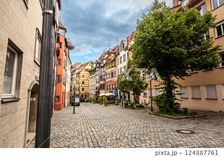 Nuremberg, Germany, August 1, 2023. The street of the tanners: it has all the charm of the old city, with the facades of the colorful and half-timbered houses. Travel destinations. 124887761