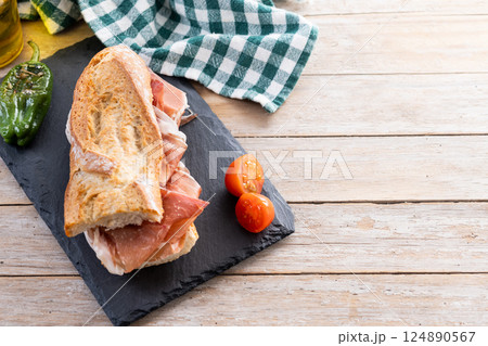 Spanish serrano ham sandwich. Spanish bocadillo de jamon serrano 124890567