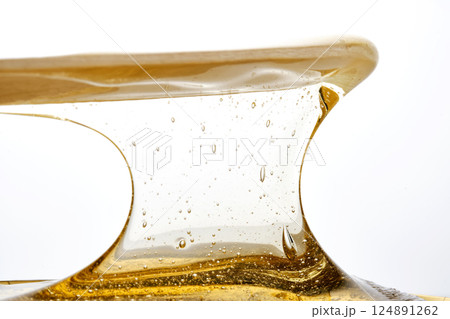 Photo of a sugar paste for depilation hair removal procedure. Texture. Photo of a sugar paste for depilation hair removal procedure. Texture. 124891262