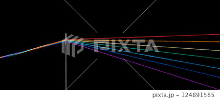 multi-colored threads for sewing in the form of a rainbow pass through an antique needle on a black background multi-colored threads for sewing in the form of a rainbow pass through an antique needle on a black background 124891585