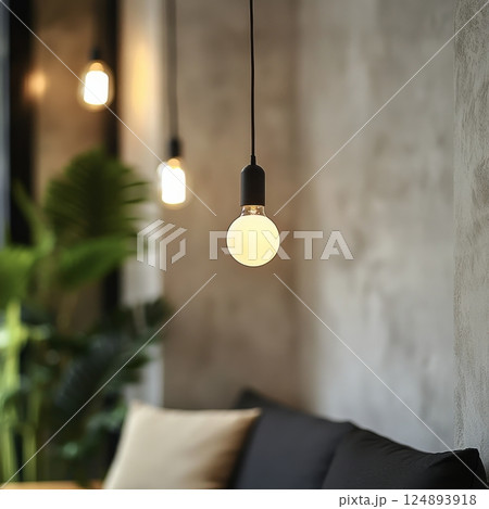 Cozy bedroom with decorative hanging lights and a serene atmosphere in evening hours 124893918