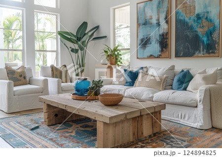 Cozy Modern Living Room with Wooden Coffee Table and Blue Accent Decor 124894825