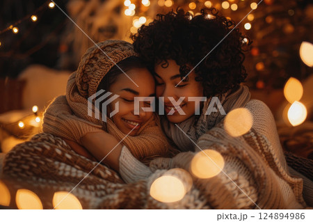 Cozy Winter Evening Embracing Warmth and Joyful Togetherness in Festive Lights Cozy Winter Evening Embracing Warmth and Joyful Togetherness in Festive Lights 124894986