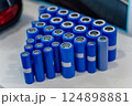 lithium ion batteries for motorcycles and cars. blue batteries for electric vehicles 124898881