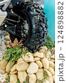 off-road quad bike wheel on a pile of rocks. off-road studded tire on mountain boulders 124898882
