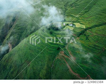 Aerial view of beautiful high altitude forest grassland mountain landscape Aerial view of beautiful high altitude forest grassland mountain landscape 124901384